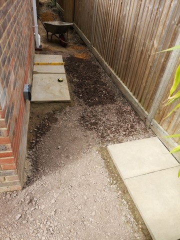 Slabs laid ready for container, slabs on the right are for my small preformed pond.