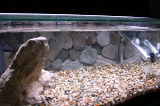 Rock wall tank